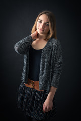 Beautiful woman doing different expressions in different sets of clothes: posing