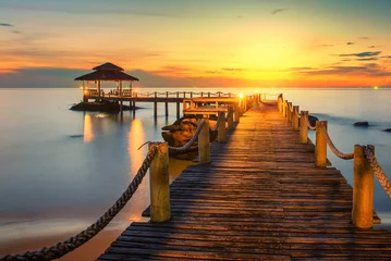 Tuinposter Summer, Travel, Vacation and Holiday concept - Wooden pier betwe © ake1150