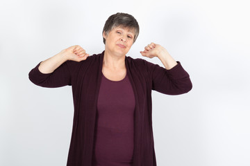 Beautiful woman doing different expressions in different sets of clothes: waking up