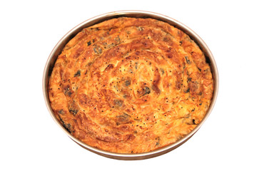 Turkish homemade spinach patty ( ispanakli borek ) in metal tray Turkish cuisine.