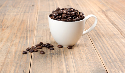 Coffee bean in white cup