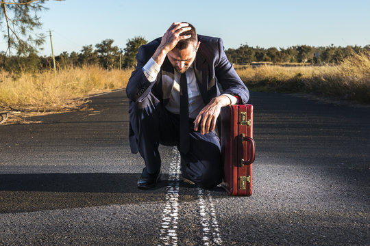 Concept: A Frustrated Business Man Is Leaving The Corporate Lifestyle And Chasing Freedom In The Outback Of Queensland, Australia. Cinematic Portrait Style.