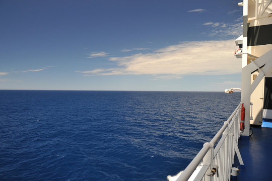 Deep blue sea and sky from ship deck