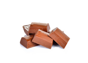chocolate pieces on white background