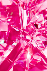 abstract pink background of crystal refractions