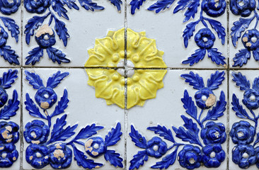 Tiled in high relief of old house and warehouse