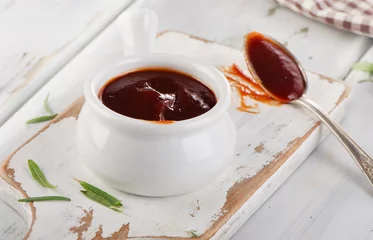 Fotobehang Sweet bbq sauce in a bowl. © bit24