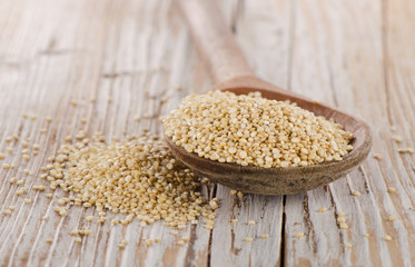Quinoa seed closeup  on  wooden background.
