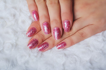 Light pink nail art with tinsel
