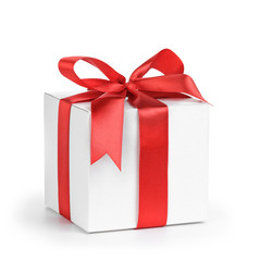 white present paper box with red ribbon bow