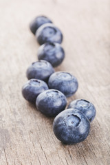 fresh blueberries on wood table