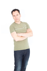 Fototapeta premium Handsome man doing different expressions in different sets of clothes: arms crossed
