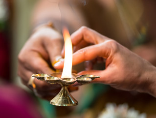 Aarthi being passed on in an Indian Hindu  Wedding