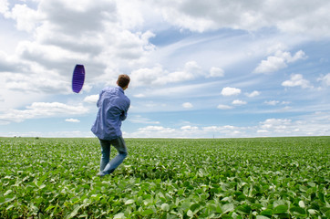 Free land kiting on green field with blue sky