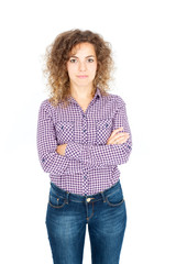 Beautiful Hispanic woman doing different expressions in different sets of clothes: arms crossed