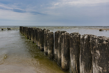 Fototapeta na wymiar Breakwater on the coast of the Baltic Sea in Poland