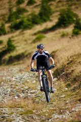 Mountain biker on trails