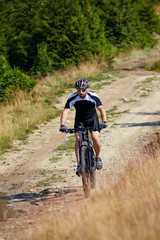 Mountain biker on trails