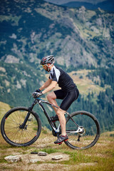 Mountain biker on trails