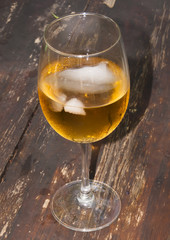 Glass of wine on a wooden table