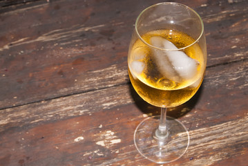 Glass of wine on a wooden table