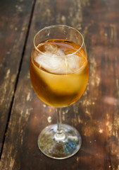 Glass of wine on a wooden table