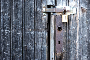 A locked wooden door..
