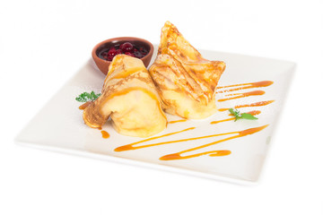 Pancakes with icecream cherry jam and caramel syrup