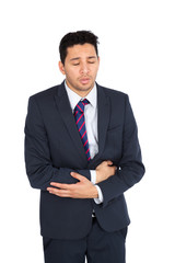 Handsome man doing different expressions in different sets of clothes: stomachache