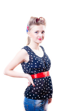 Stylish picture of young blond girl with hair curlers in polka