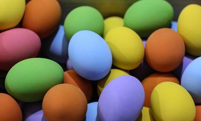 Background colorful easter eggs in the wooden box