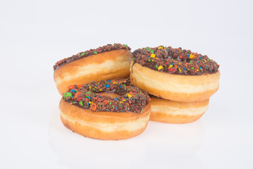 chocolate donuts on a white background