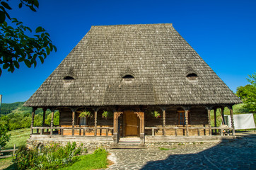 Fototapeta na wymiar Barsana wooden monastery, Maramures, Romania. Barsana monastery is one of the main point of interest in Maramures area.