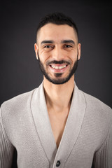 Handsome man doing different expressions in different sets of clothes: love