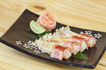 Traditional japanese food, Golden mushroom wrapped in Bacon
