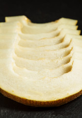 Ripe melon on a dark background, selective focus