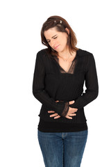 Obraz premium Beautiful woman doing different expressions in different sets of clothes: stomachache