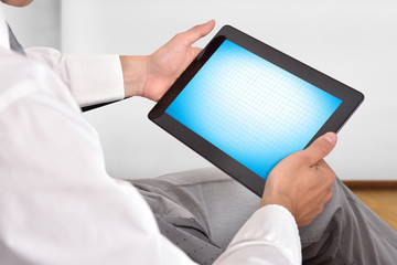 businessman holding touch pad