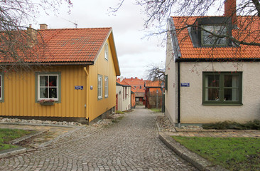 Fototapeta na wymiar The view to the street in the old district of Vasteras city in S