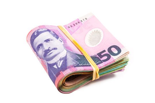 folded fifty dollar bills