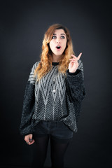 Beautiful woman doing different expressions in different sets of clothes: idea