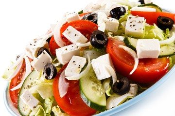 Greek salad on white background