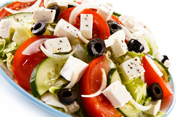 Greek salad on white background
