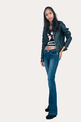 Beautiful woman doing different expressions in different sets of clothes: posing