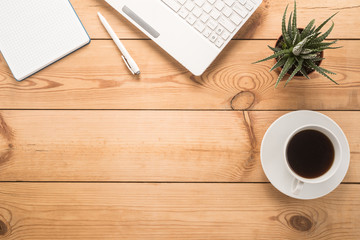  Office table with cup of coffee 
