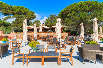 Restaurant on sandy Palombaggia beach, Corsica island, France.