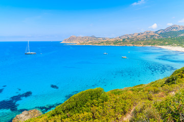 Fototapeta na wymiar View of beautiful bay with azure sea water at Ostriconi beach, Corsica island, France