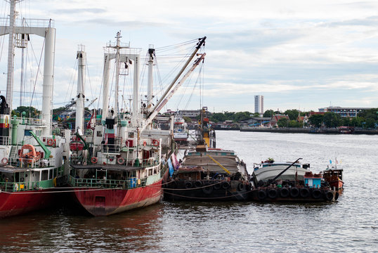 Cargo Ship docked in Chao Phraya River, Bangkok, Thailand