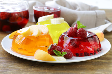 berry fruit jelly with fresh berries - summer dessert