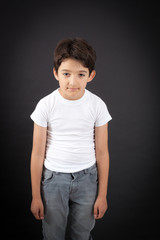 Fototapeta premium Handsome boy doing different expressions in different sets of clothes: surprise